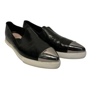 Miu Miu Black Leather Slip-On Loafers with Silver Cap Toe